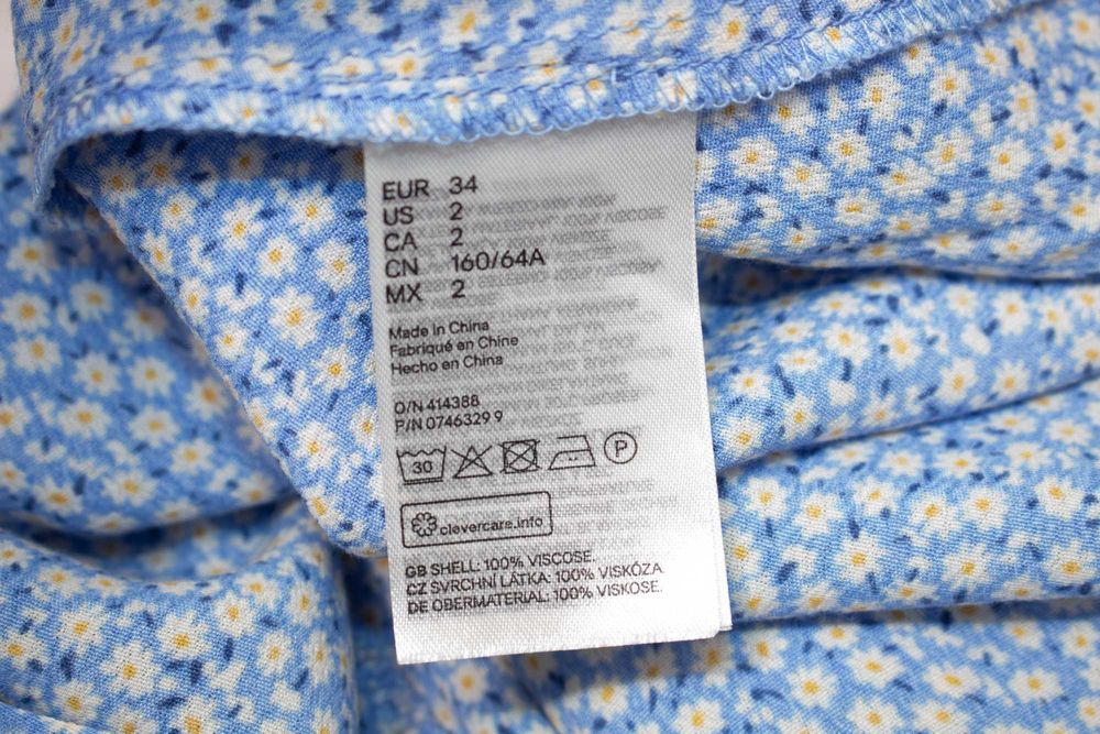 H&M дамска пола миди синя на маргаритки голяма цепка 34 XS
