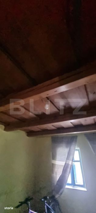 Casa cu doua corpuri