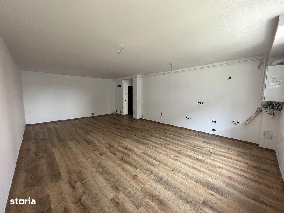 Apartament 2 camere, 64 mp utili, posibilitate finisare, zona Podului — fotografia 2