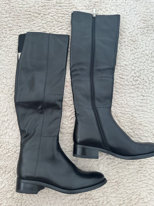 Продам новые сапоги  BASCONI