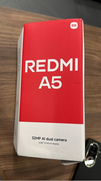Продам телефон почтм новый Redmi A5