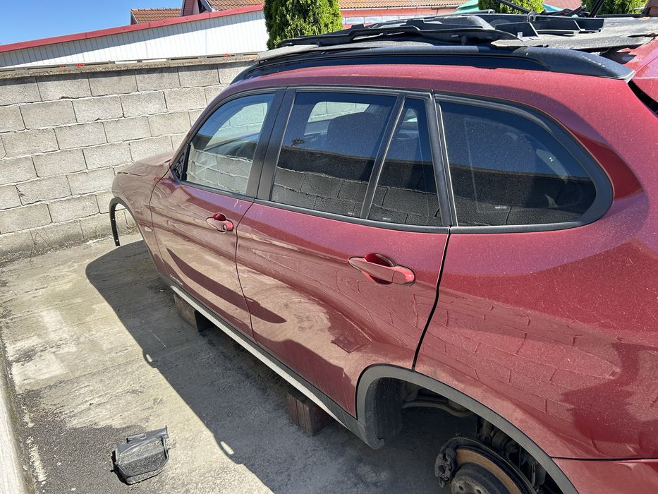 Usa laterala stanga dreapta bmw X1 e84 an 2010 Vermilion rot metallic