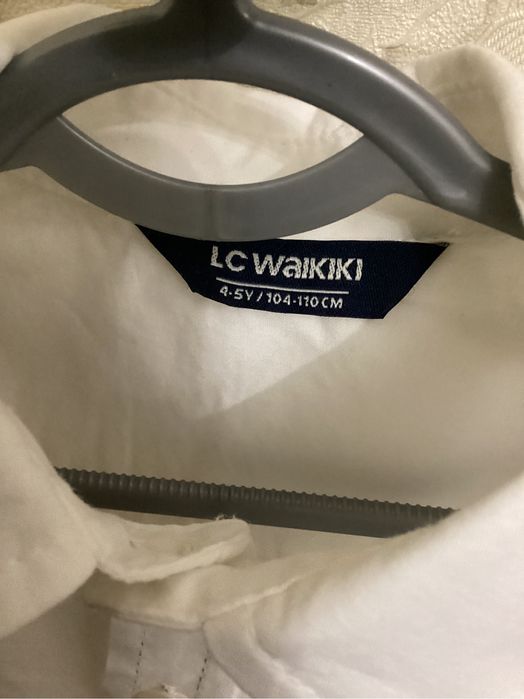 Белая рубашка на мальчикаLC WAIKIKI