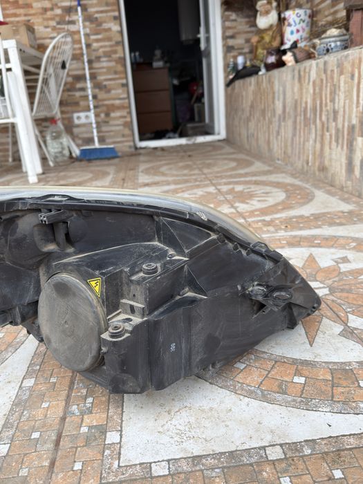 Far adaptiv cu halogen de pe partea stanga  de opel zamfira + modul