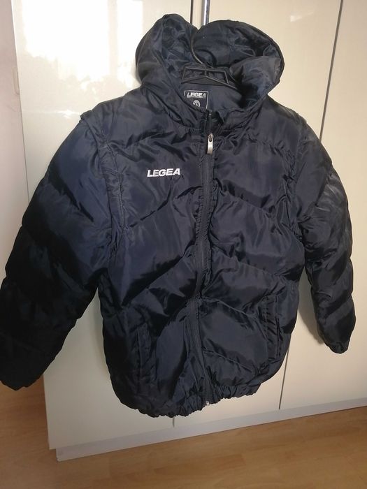 Пуховик новый на 10 лет