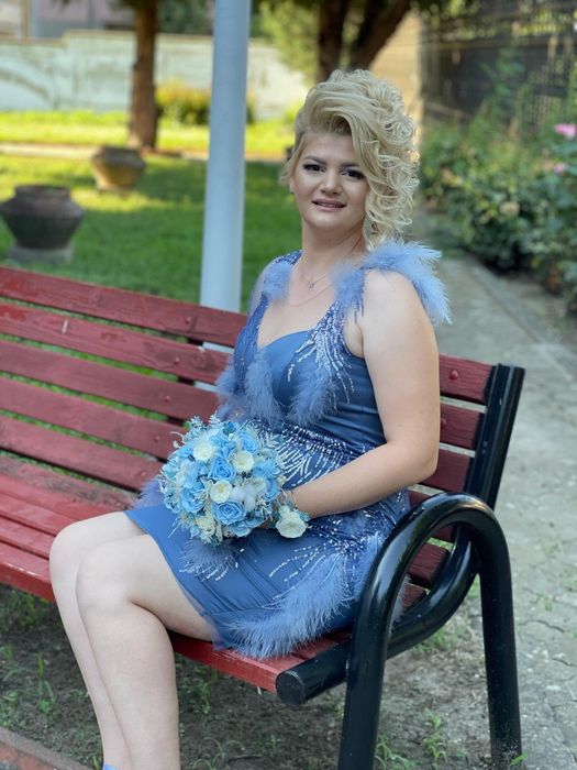 Rochie cu pene naturale.