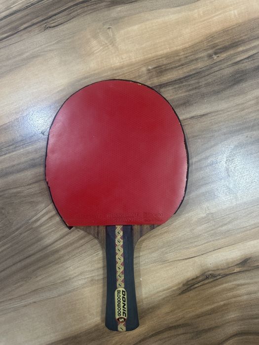 теннисная ракетка с шипами