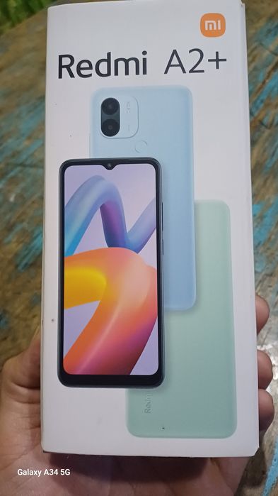 Редми А2 телефон