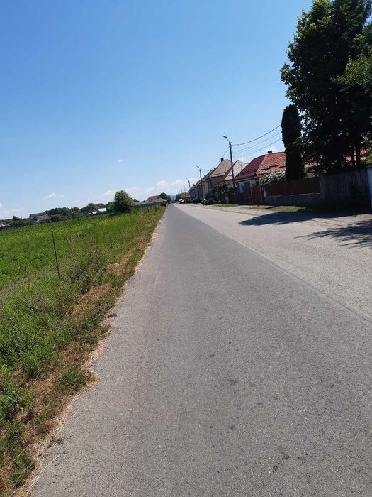 Vand teren intravilan construibil toate utilitatile la drum asfaltat central Lunca Calnicului