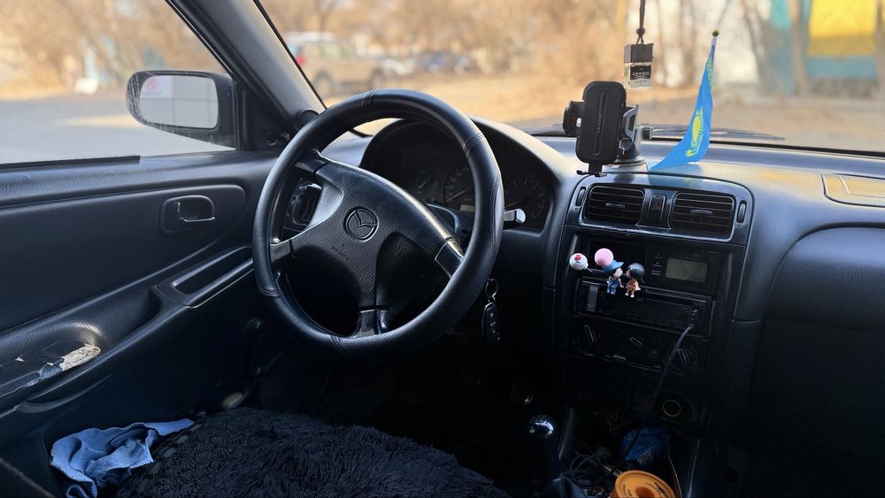 Мазда 626 птичка