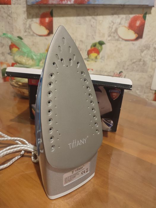 Продам новый утюг