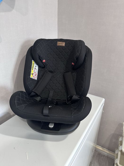 Продам автокресло tomix