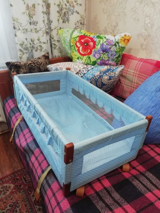 Люлька на кроватку с калесиками