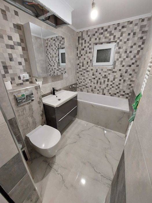 Proprietar Vand Apartament 4 cam 2 bai decomandat zona E3 Parter 80 Mp