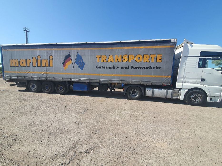 Тягач MAN 2012г прицеп SHMITZ