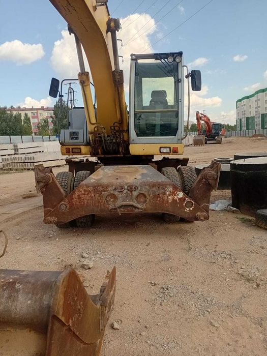 Экскаватор самоходный NEW HOLLAND