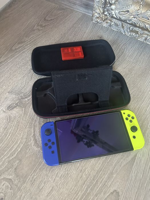 Nintendo switch blue and yellow edition with 3 games