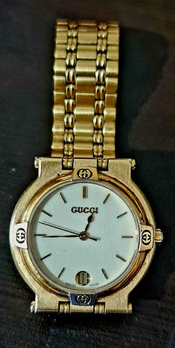 GUCCI ceas unisex vintage , damă in stare foarte buna , placat cu aur
