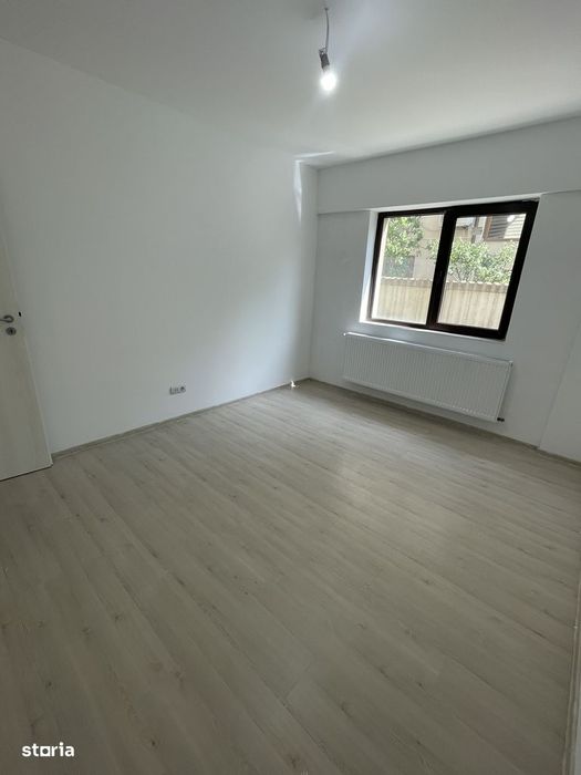 Apartament 2 camere decomandat, 52mp, curte proprie cadastrată — fotografia 2