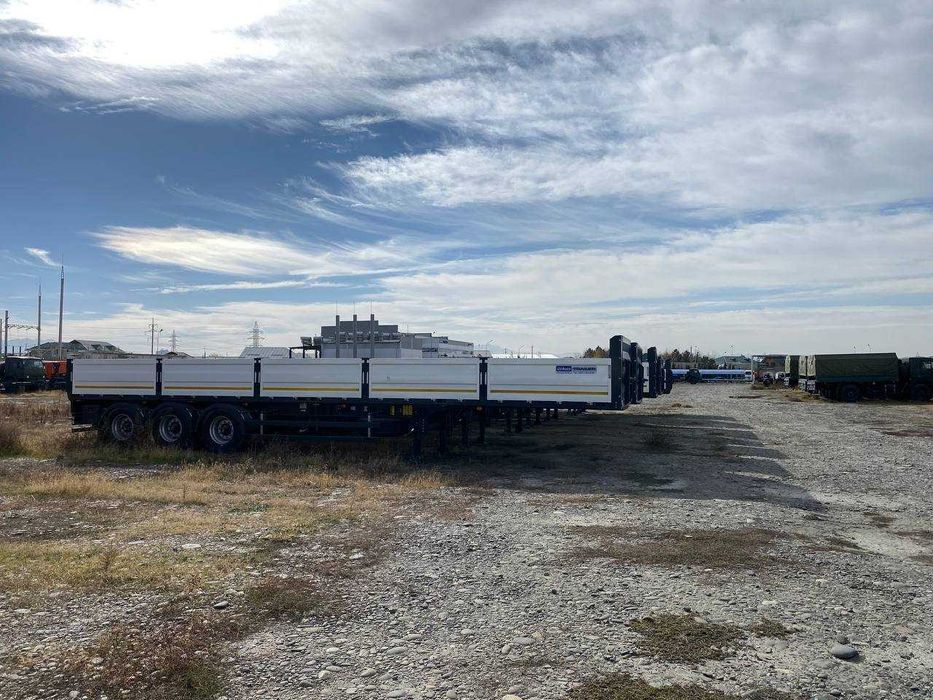 B наличии!!! Полуприцеп бортовой контейнеровоз UzAutoTrailer (2025)