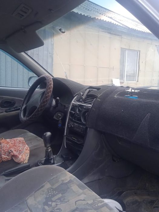 Мицубиси каризма