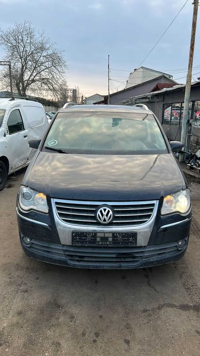 Dezmembrez Volkswagen Touran an 2007 2.0 bkd cutie automata