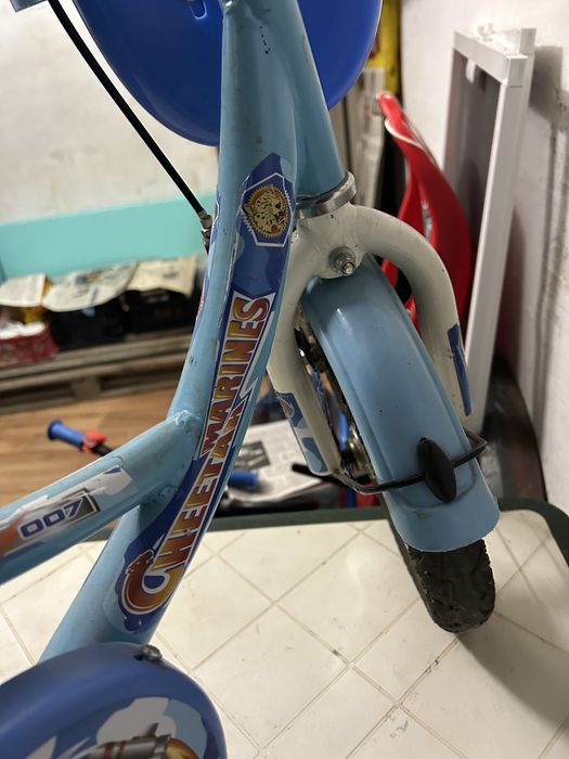 Детско колело със помощни колела и кошници