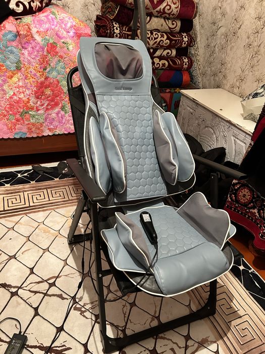 Массажный кресло