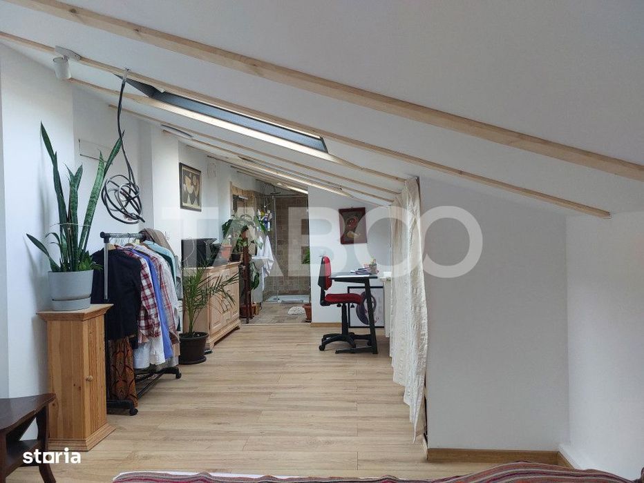 Apartament de vanzare 105 mp 3 camere curte 340 mp in acte Cisnadie