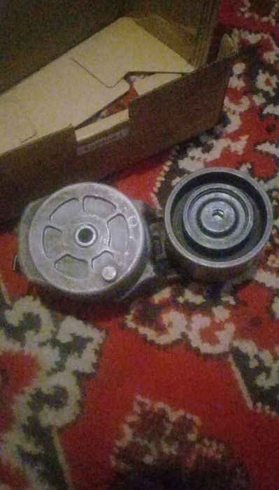 Натяжитель с роликом QSM 11 серии 2000