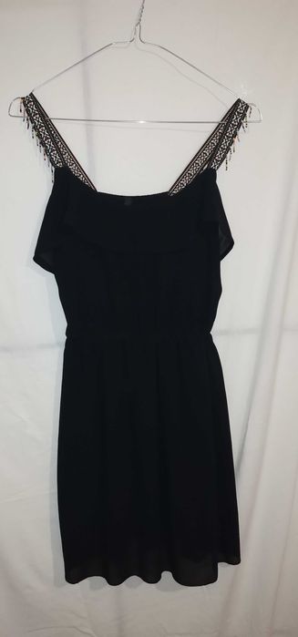 Черна рокля и черен гащеризон