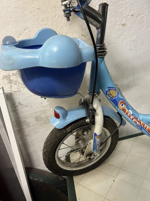 Детско колело със помощни колела и кошници