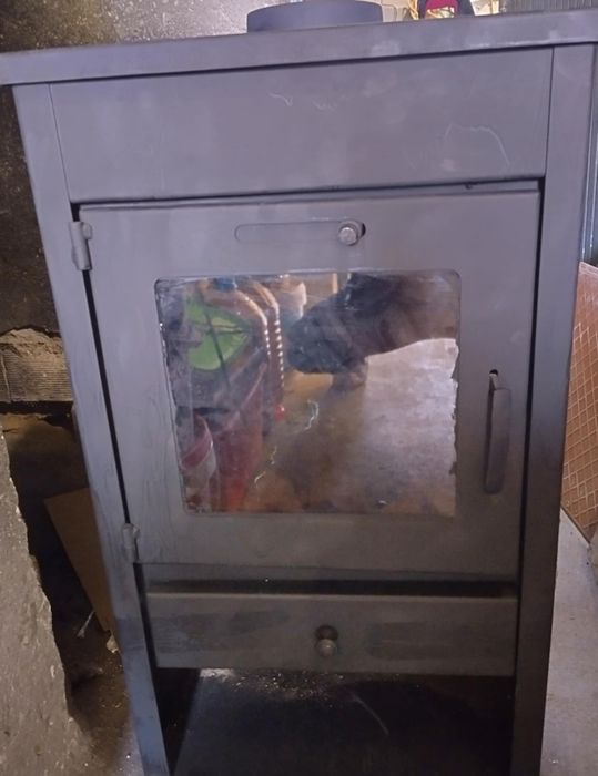 Камина на дърва и твърдо гориво