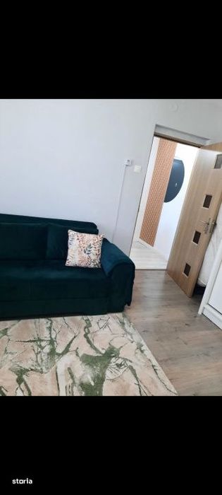Apartament de 2 camere cu balcon si loc de parcare .