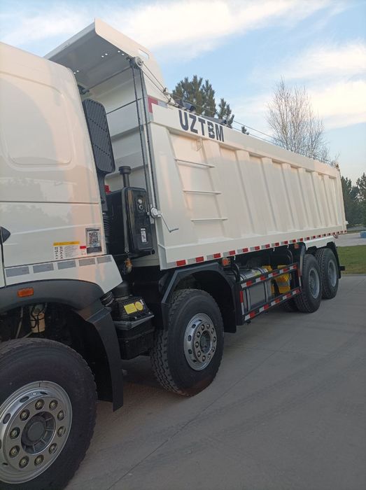Самосвал HOWO-T7S 8x4 - 32 т / 26 куб.м Sunhunk