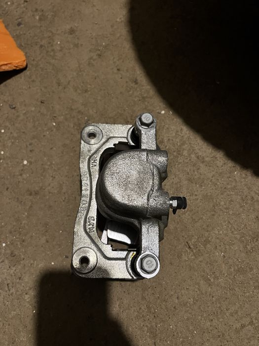 Суппорт задний левый SsangYong Kyron