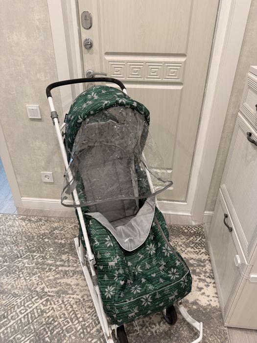 Продам б/у санки-коляску