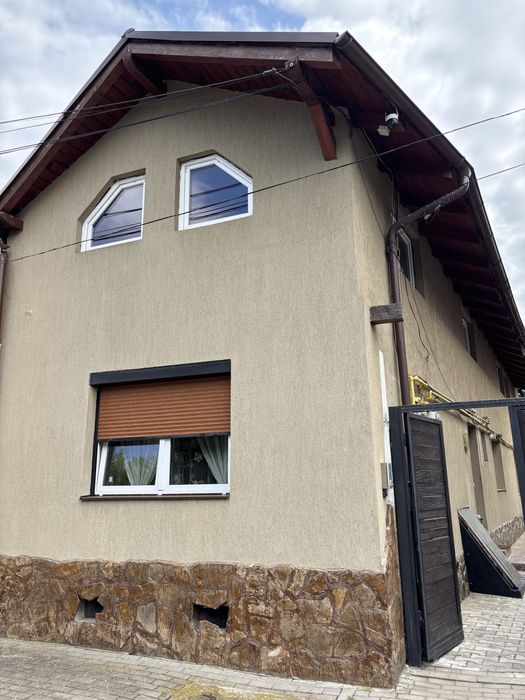 Apartament la casa cu curte
