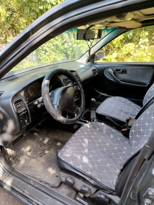 Ниссан примера w10