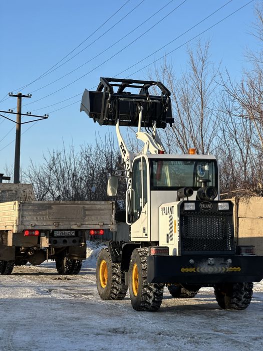 Фронтальный погрузчик 1.5т 0,6куб