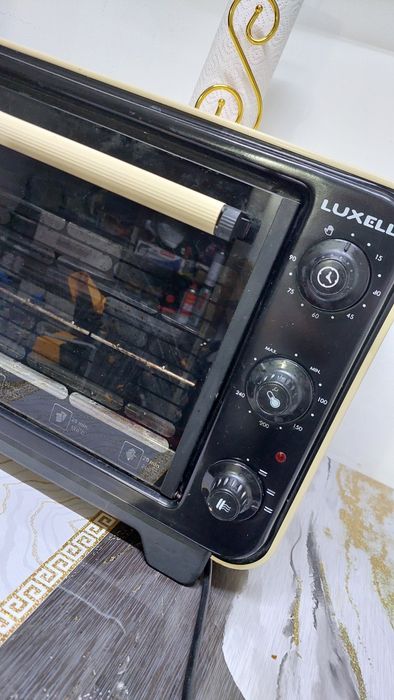 Продам Духовой шкаф Luxell.