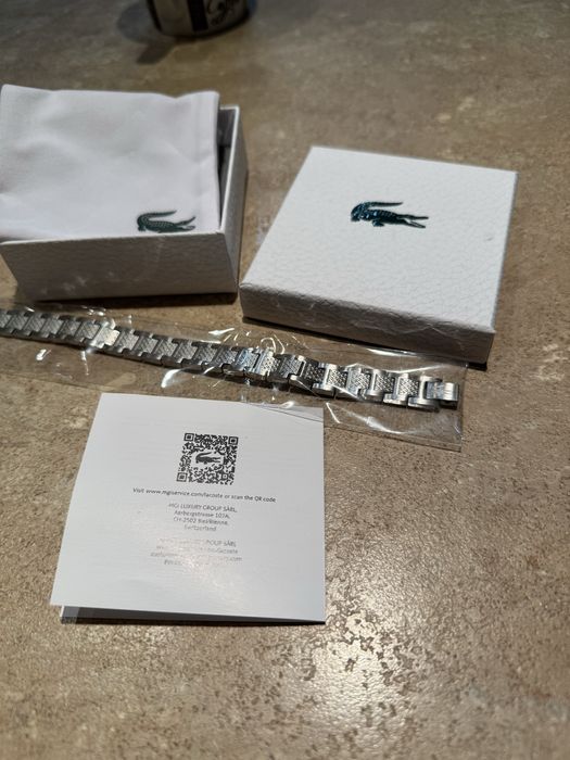 Гривна Lacoste Metropole