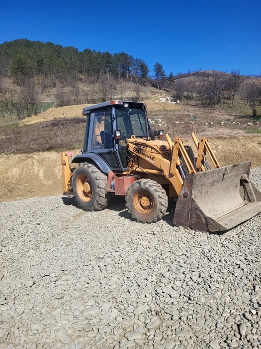Vând buldoexcavator case 580sle