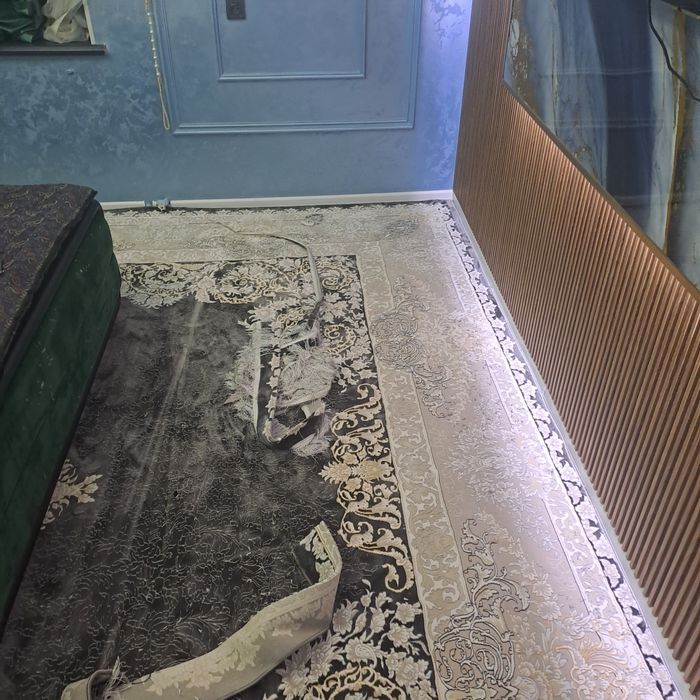 Gilam kesish va tikish