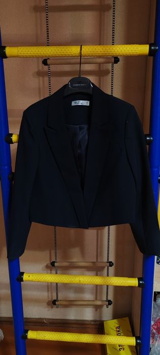 Продам пиджак синего цвета deloras