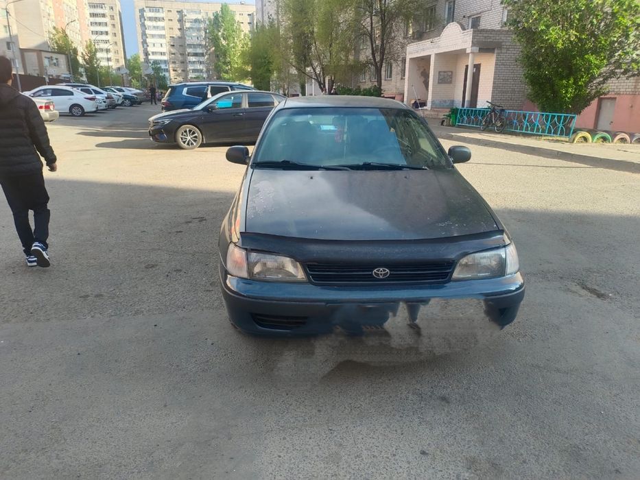 Тайота карина Е