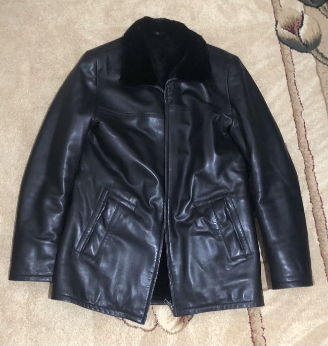 Кожаная куртка .
