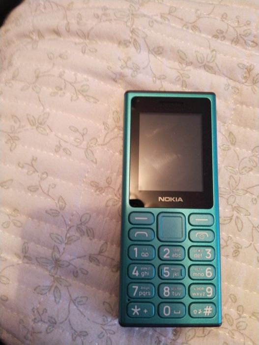 Продам кнопочный телефон