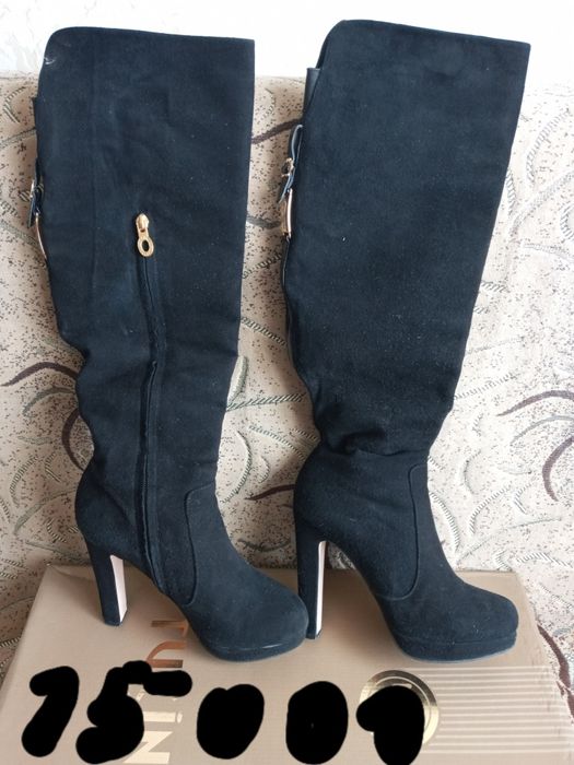 Продам женские кожаные сапоги