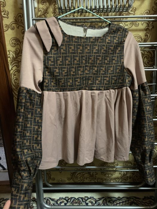 Kurtka kiyimla qizlar uchun